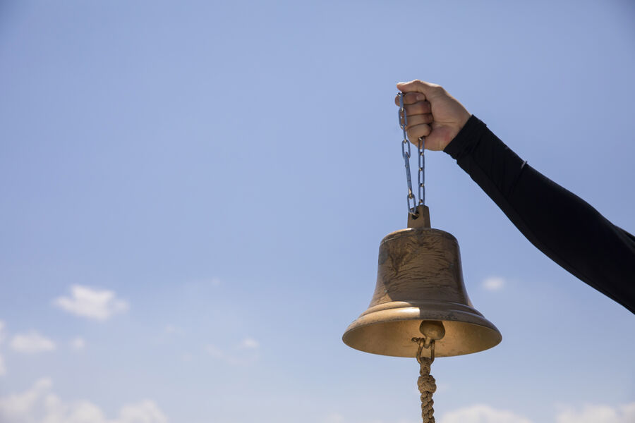 The ship's bell rung in memory of the departed